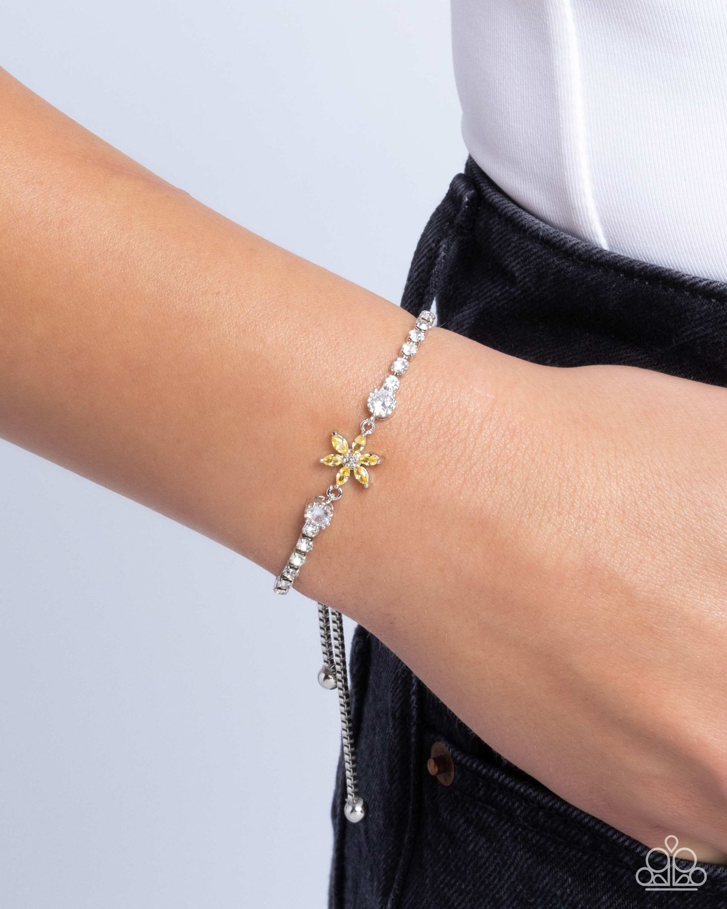 Dainty Delivery - Yellow Rhinestone Flower Silver Sliding Closure Bracelet - Paparazzi Accessories