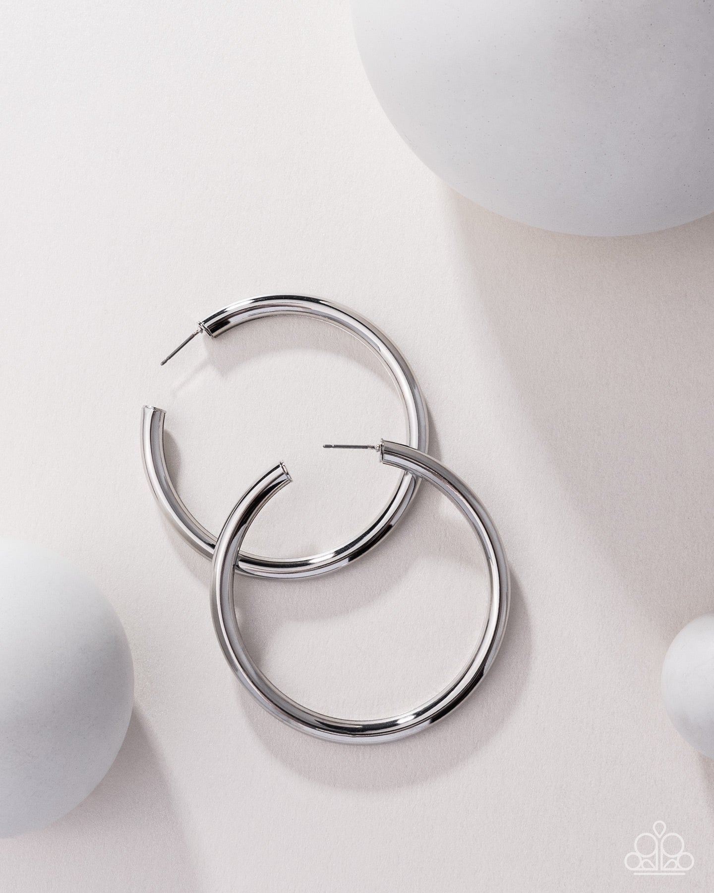 Curve Ball - Silver Hoop Blockbuster Earrings - Paparazzi Accessories