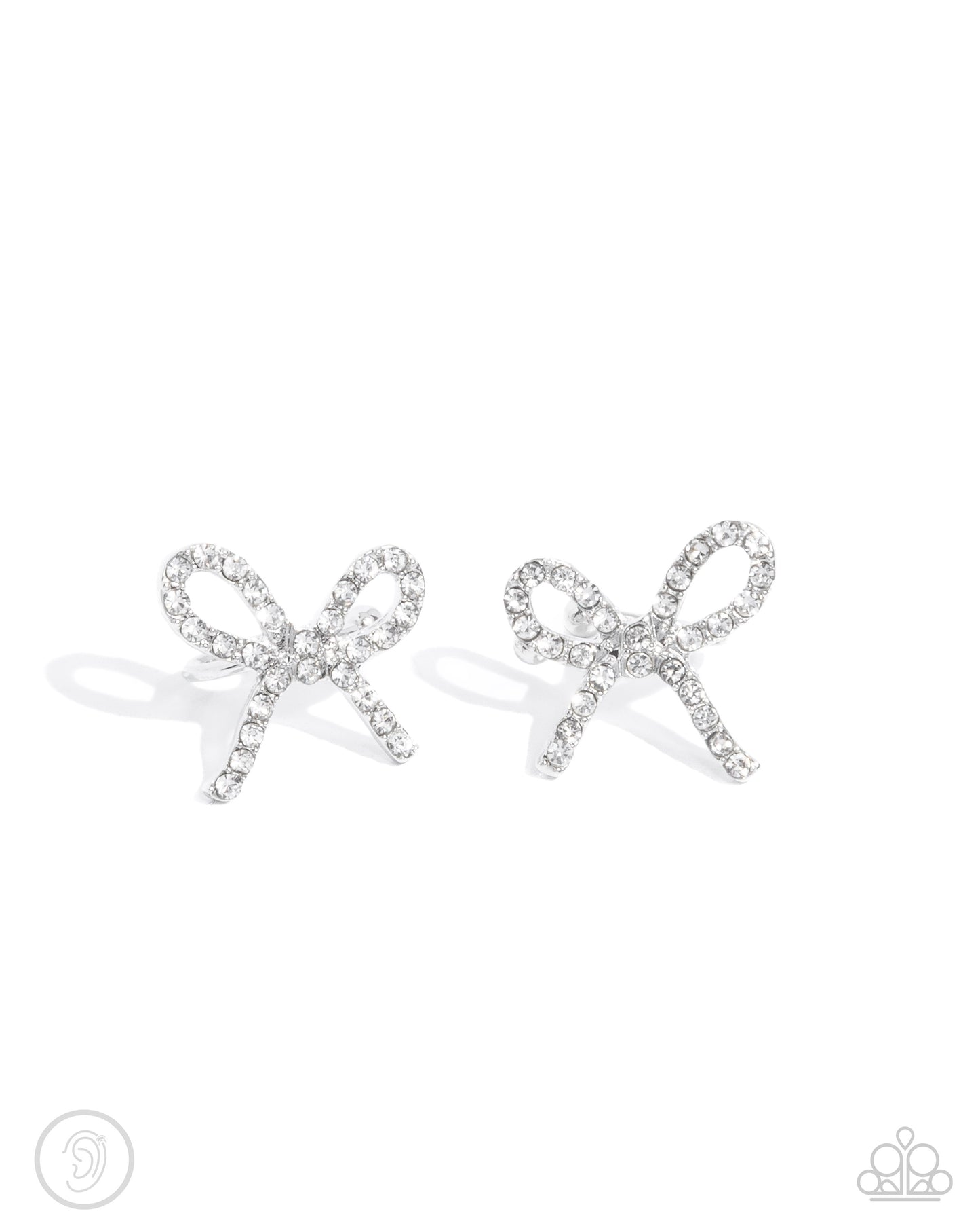 Convincing Charm - White Rhinestone Silver Bow Ear Cuff Earrings - Paparazzi Accessories