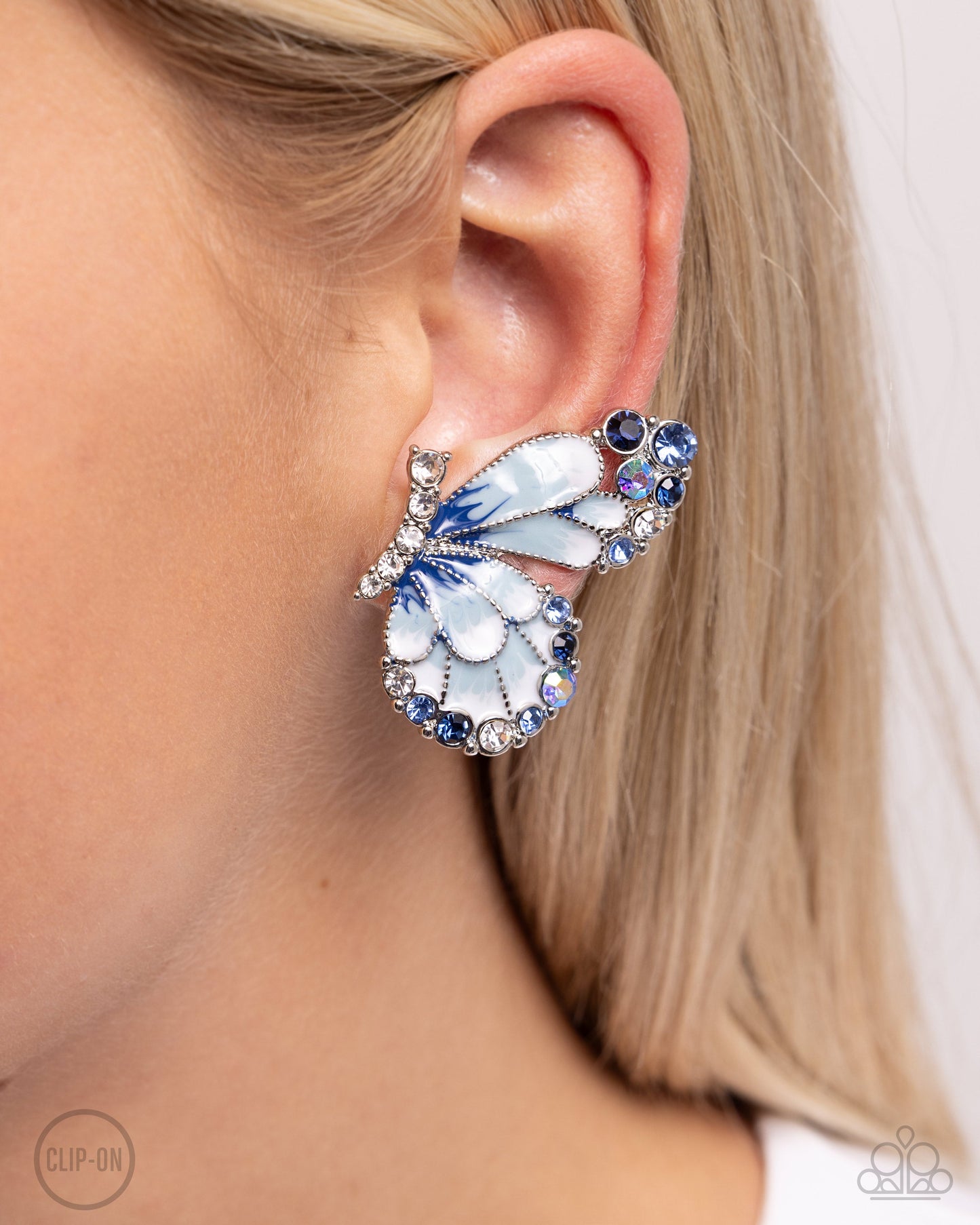Decadent Descent - Blue Enamel Silver Butterfly Clip-on Earrings - Paparazzi Accessories