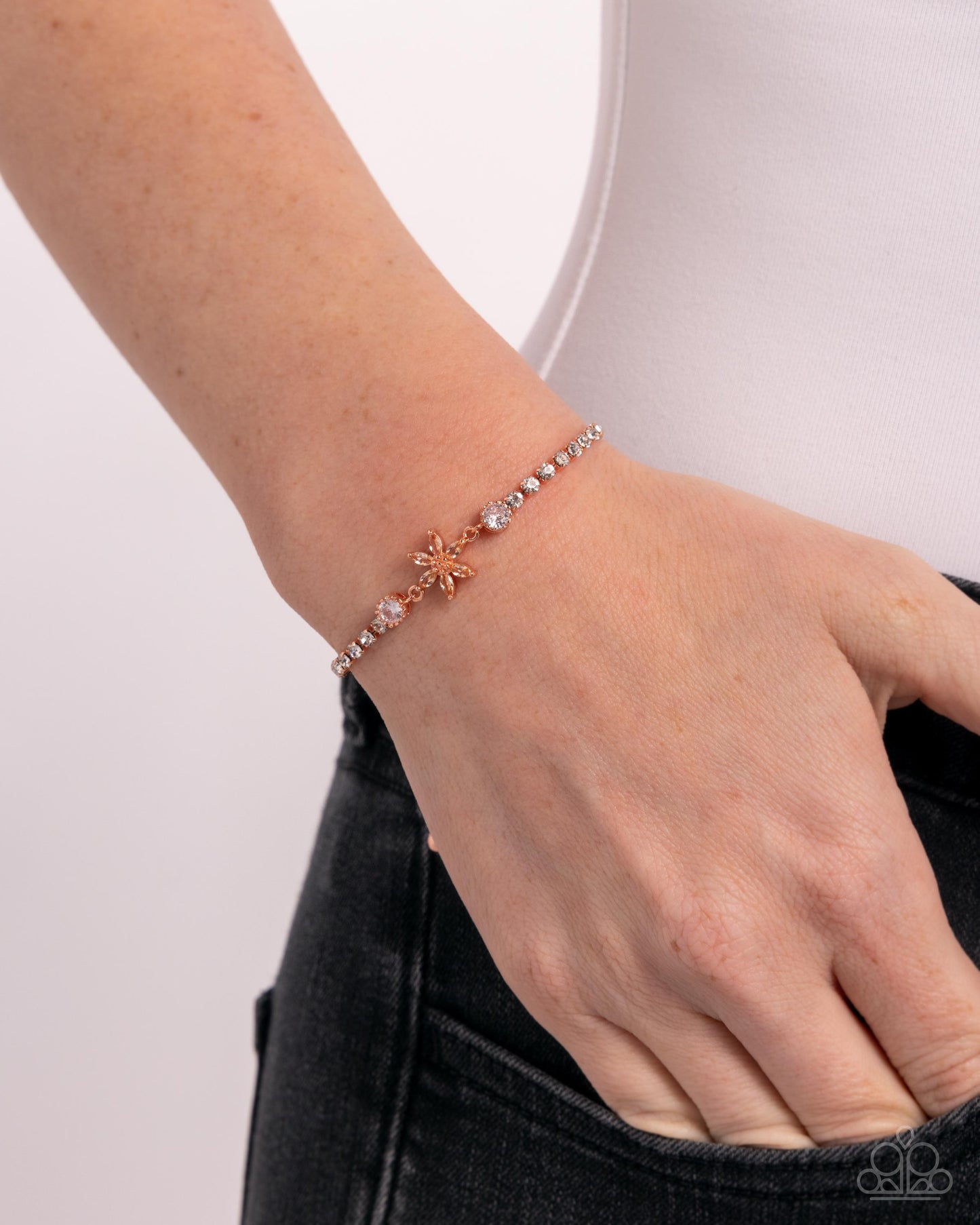 Dainty Delivery - Copper & White Rhinestone Flower Sliding Closure Bracelet - Paparazzi Accessories