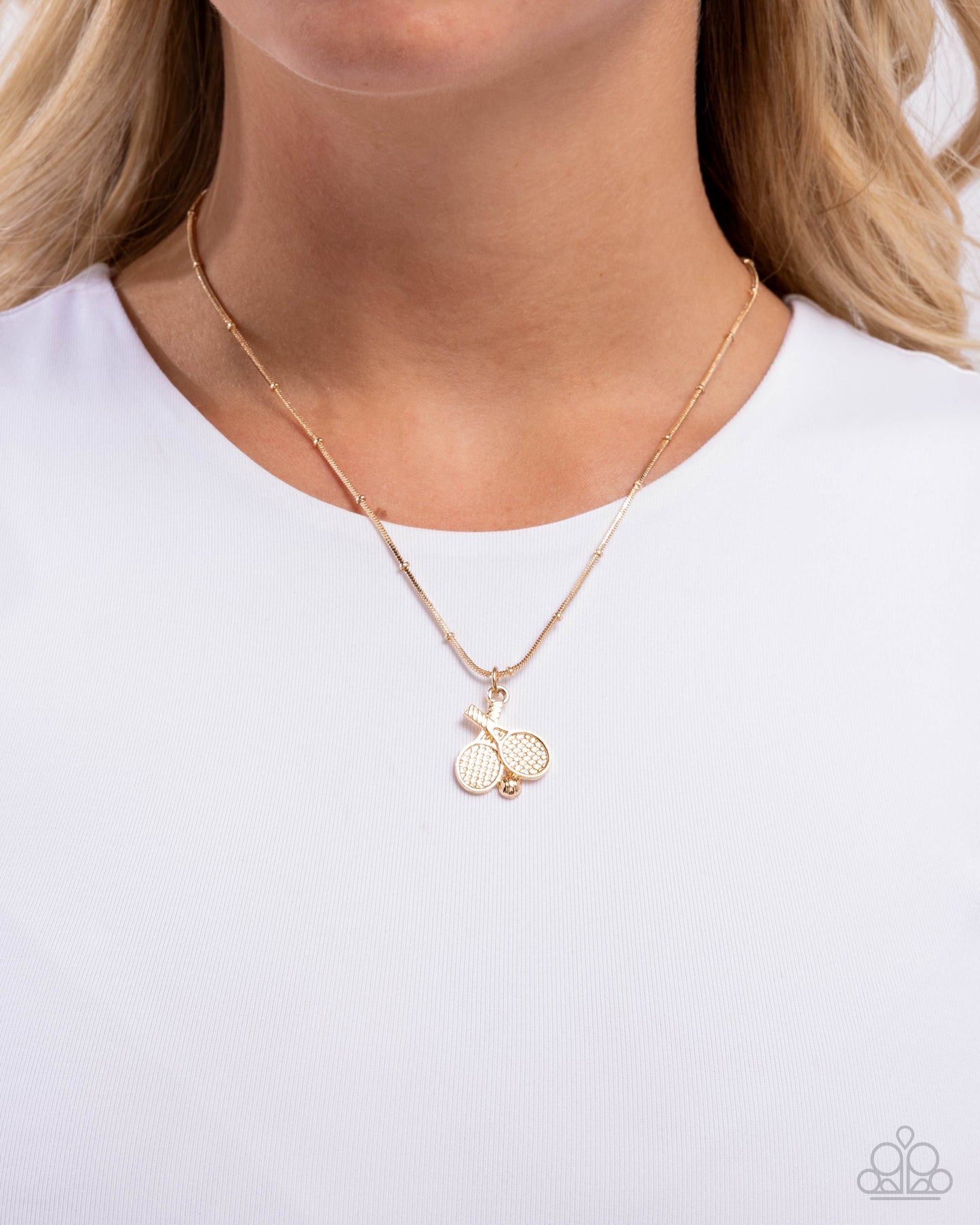 Adorable Ace - Gold Tennis Ball & Racket Necklace - Paparazzi Accessories