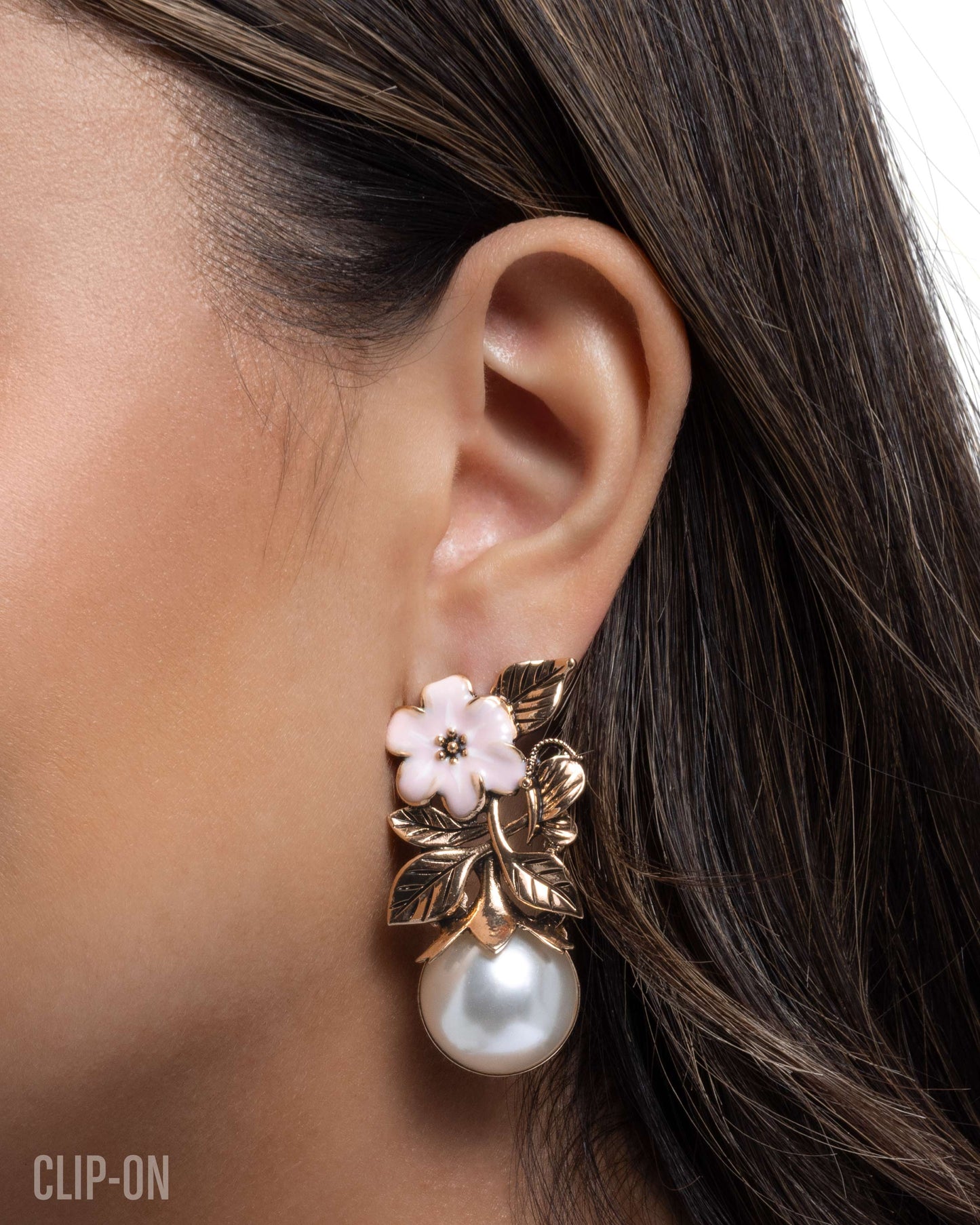 Elegant Evolution - Gold - Clip-on Earrings - Paparazzi Accessories