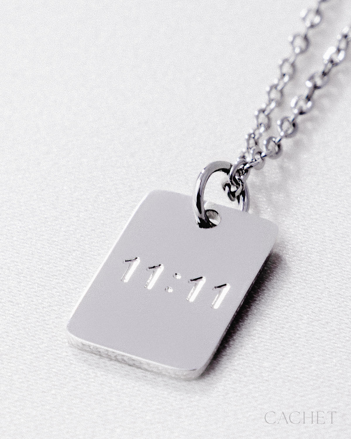 Intemporelle - Rhodium Cachet "11:11" Pendant Necklace - Paparazzi Accessories