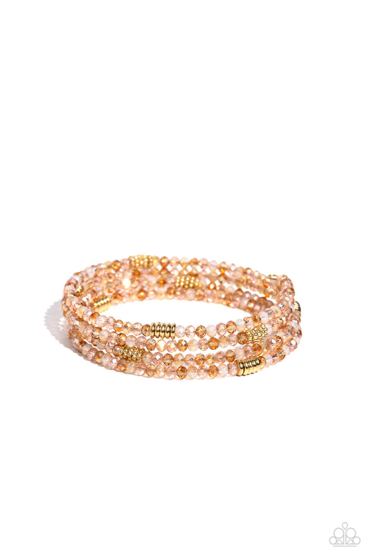 Dreamy Debut - Gold Crystal Coil Bracelet - Paparazzi Accessories