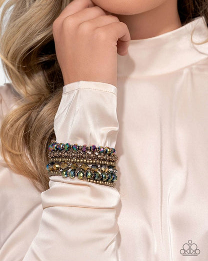 Stacked Surprise - Multi UV Shimmer, Oil Spill, & Antiqued Gold Bead Infinity Coil Bracelet - Life of the Party Exclusive May 2025 - Paparazzi Accessories