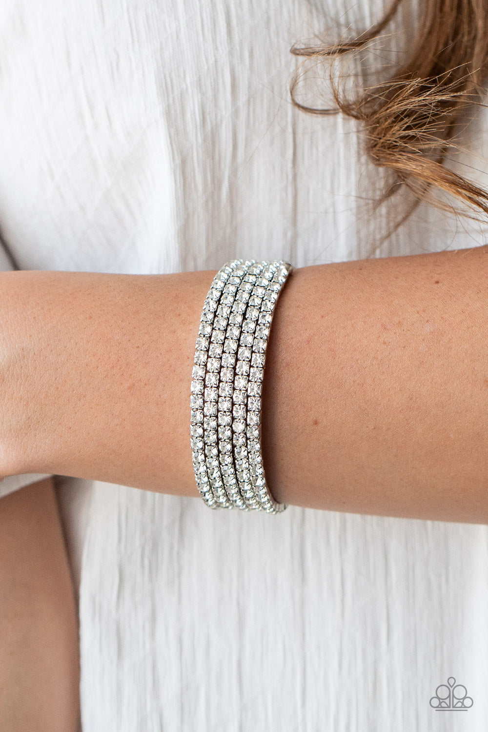 The GLOW-Digger - White Rhinestone Silver Coil Bracelet - Black Diamond Exclusive - Paparazzi Accessories