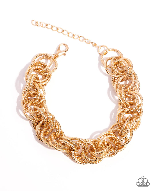 Audible Shimmer - Gold Clasp Bracelet - Paparazzi Accessories