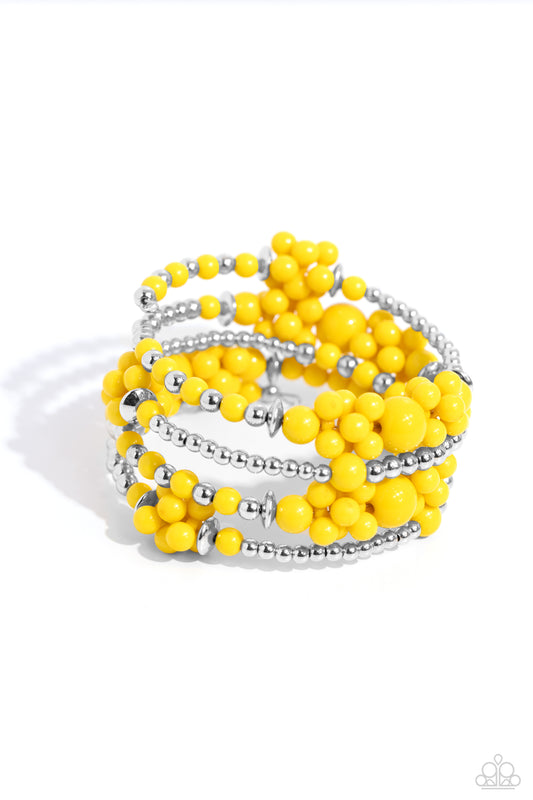 Compelling Clouds - Yellow Acrylic Bead Coil Bracelet - Paparazzi Accessories