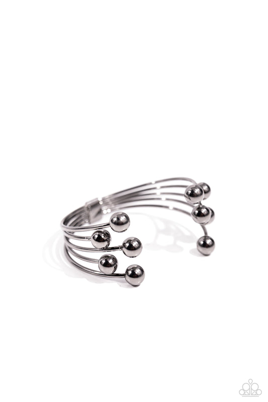 Assembly Line - Black - Gunmetal Cuff Bracelet - Paparazzi Accessories