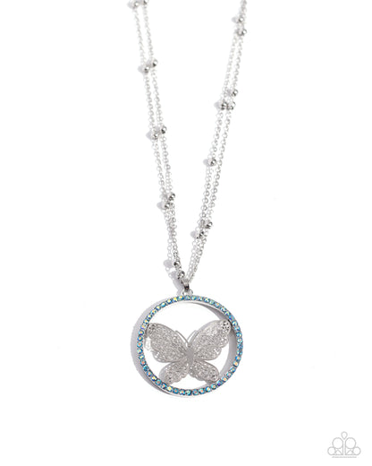Festive Flight - Blue Iridescent Rhinestone Butterfly Pendant Necklace - Paparazzi Accessories