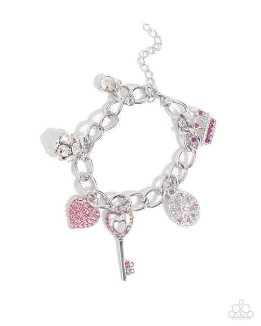 Regal Ratio - Pink Rhinestone Crown Charm Clasp Bracelet - Paparazzi Accessories