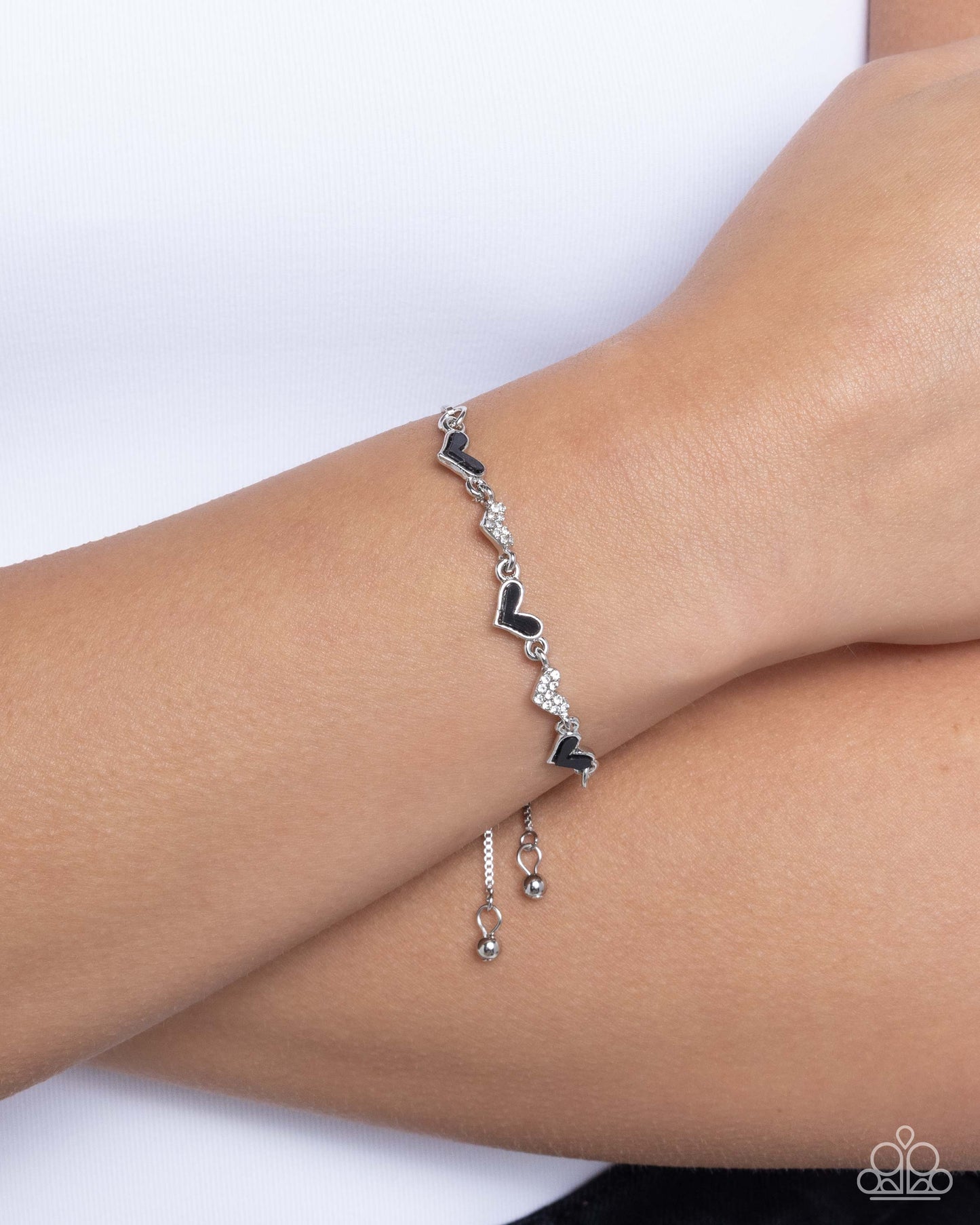 Heart-struck Hype - Black Enamel Hearts Silver Sliding Bead Closure Bracelet - Paparazzi Accessories