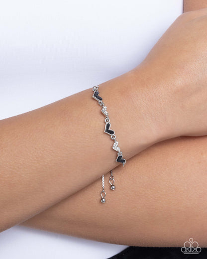 Heart-struck Hype - Black Enamel Hearts Silver Sliding Bead Closure Bracelet - Paparazzi Accessories