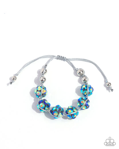 Knotted Kindness - Blue Iridescent Rhinestone Encrusted Sliding Knot Closure Bracelet - Paparazzi Accessories