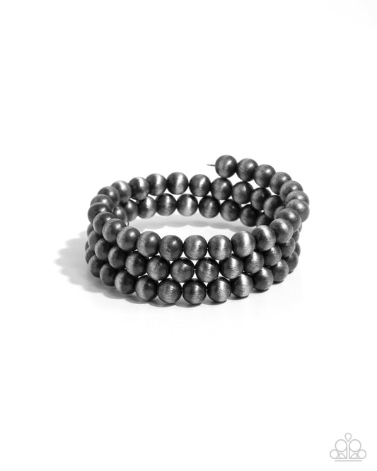 Coiled Catwalk - Silver Navajo Pearl Coil Bracelet - Paparazzi Accessories