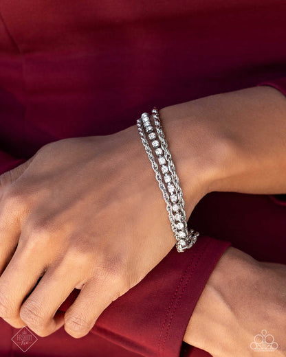 Excessive Empire - White Rhinestone Silver Clasp Bracelet - Paparazzi Accessories