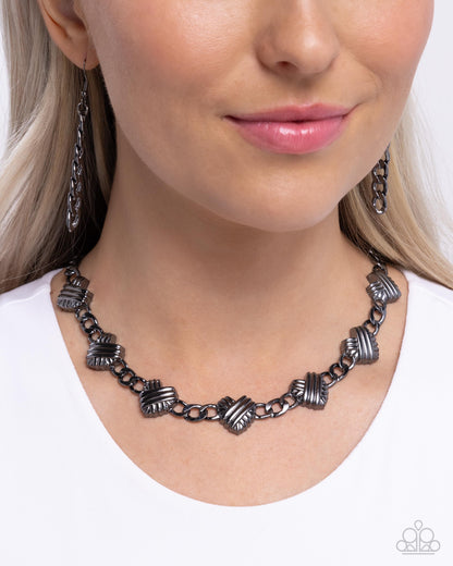Mingling Medley - Black Gunmetal Hearts Necklace - Paparazzi Accessories