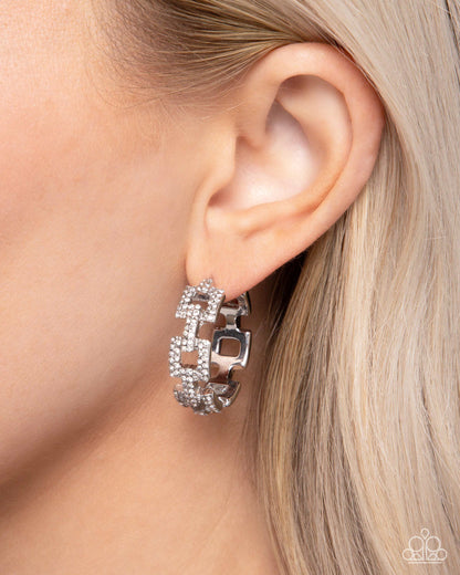 Geometric Glimpse - White Rhinestone Silver Hinge Hoop Earrings - Paparazzi Accessories