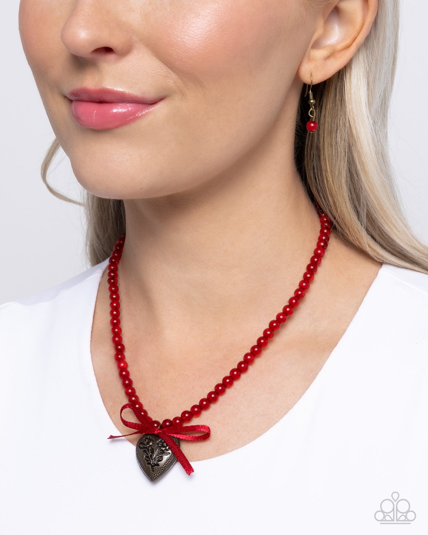 Tasteful Trimming - Red Beaded Satin Bow Brass Heart Pendant Necklace - Paparazzi Accessories