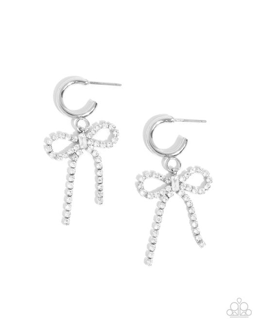 Whispering Whimsy - White Rhinestone Bow Silver Drop Hoop Earrings - Paparazzi Accessories