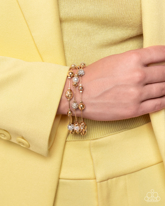 Classy Cruise - Gold, Pearl, White Rhinestone Clasp Bracelet - Paparazzi Accessories