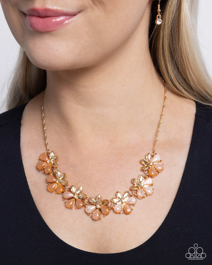 Consistent Chic - Orange Glitter-Infused Gem Flower Necklace - Paparazzi Accessories