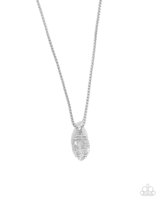 End Zone Elegance - White Rhinestone Football Pendant Necklace - Paparazzi Accessories