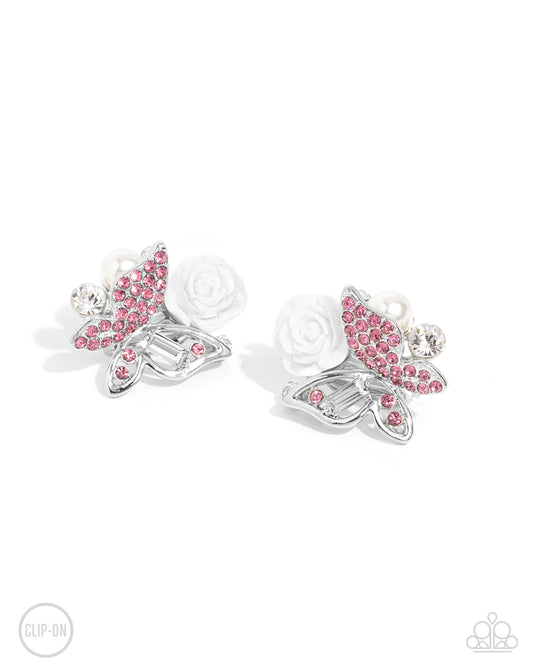 Fanciful Facade - Pink Rhinestone Butterfly White Resin Rose Silver Clip-on Earrings - Paparazzi Accessories