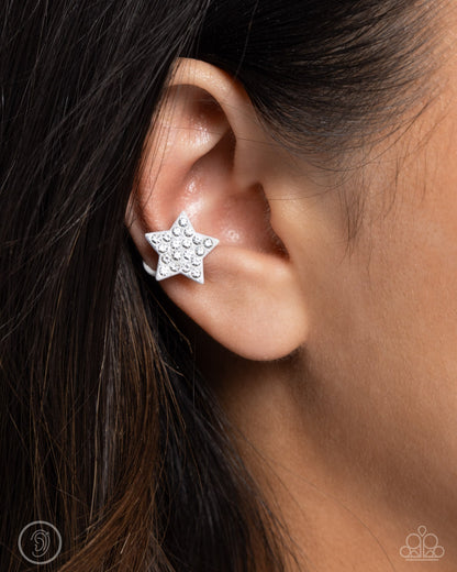 Stellar Skill - White Dipped Metal Star Ear Cuff Earrings - Paparazzi Accessories