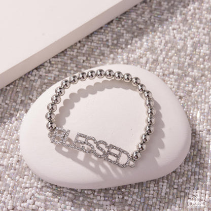 Blessed Bounty - White Rhinestone "BLESSED" Stretchy Bracelet - Paparazzi Accessories