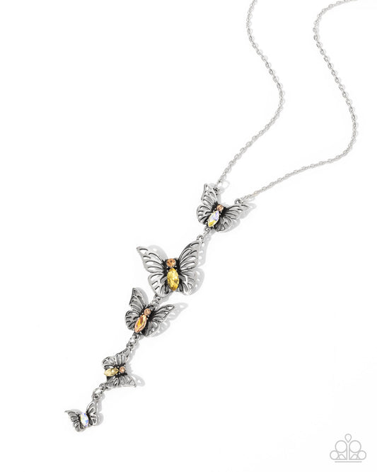 Aerial Addition - Yellow UV Rhinestone Butterfly Necklace - Paparazzi Accessories