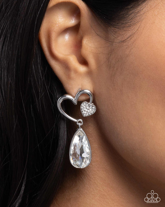 Coupling Up - White Rhinestone Teardrop Silver Heart Post Earrings - Paparazzi Accessories