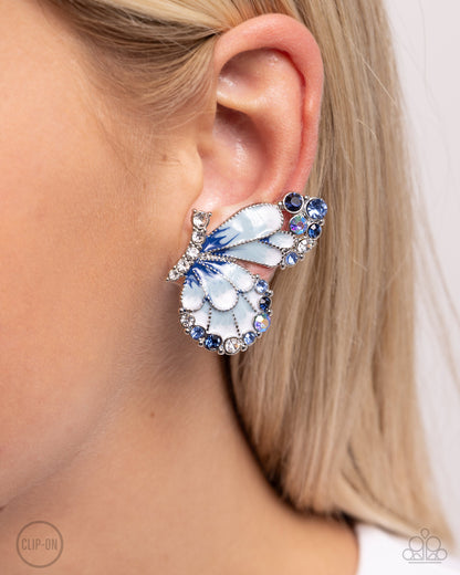 Decadent Descent - Blue Enamel Silver Butterfly Clip-on Earrings - Paparazzi Accessories
