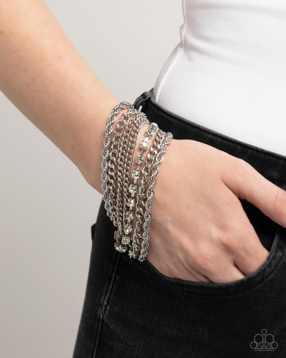Executive Extravagance - White Rhinestone Silver Clasp Bracelet - Paparazzi Accessories