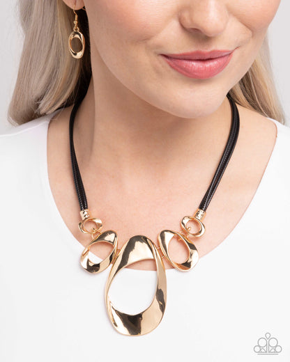 Apprehensive Accent - Gold Ovals Black Cord Necklace - Paparazzi Accessories