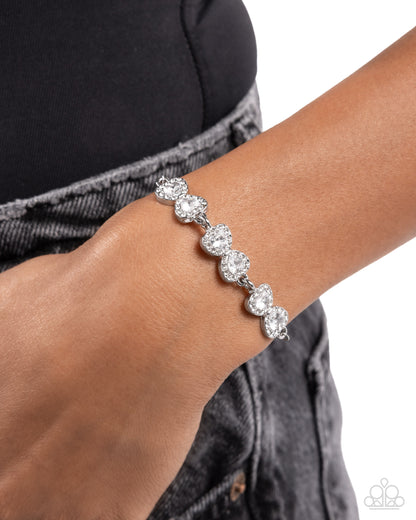 Angelic Afterlife - White Rhinestone Hearts Silver Sliding Bead Closure Bracelet - Paparazzi Accessories