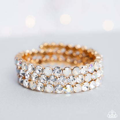 Iridescent Incantation - Gold & Iridescent Rhinestone Coil Bracelet - Paparazzi Accessories