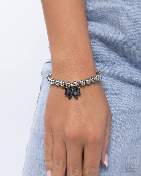Young Lady - Black Acrylic Bow Charm Silver Stretchy Bracelet - Paparazzi Accessories
