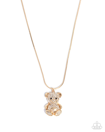 Cuddly Chic - Gold & White Rhinestone Teddy Bear Pendant Necklace - Paparazzi Accessories