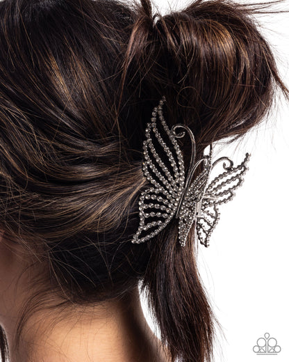 Floating Fanfare - White Rhinestone Silver Butterfly Claw Clip - Paparazzi Accessories