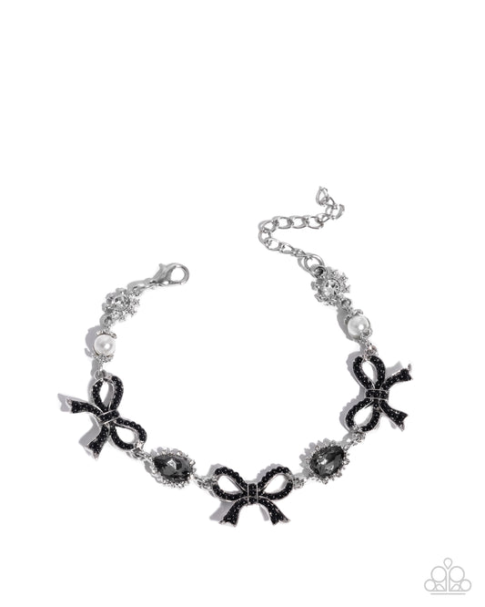 Coquette Caliber - Black Beads Silver Bows Clasp Bracelet - Paparazzi Accessories