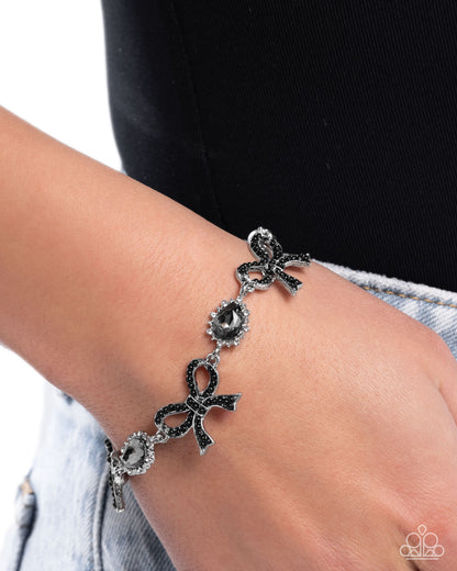 Coquette Caliber - Black Beads Silver Bows Clasp Bracelet - Paparazzi Accessories