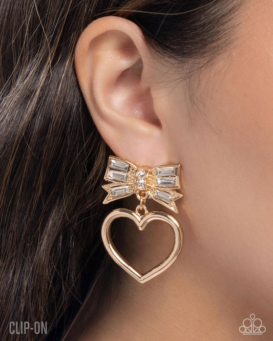 Matchmaking Model - Gold Heart White Rhinestone Bow Clip-on Earrings - Paparazzi Accessories