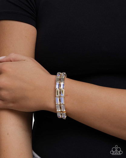 Symmetrical Statement - Yellow UV Shimmer Rhinestone Bracelet - Paparazzi Accessories