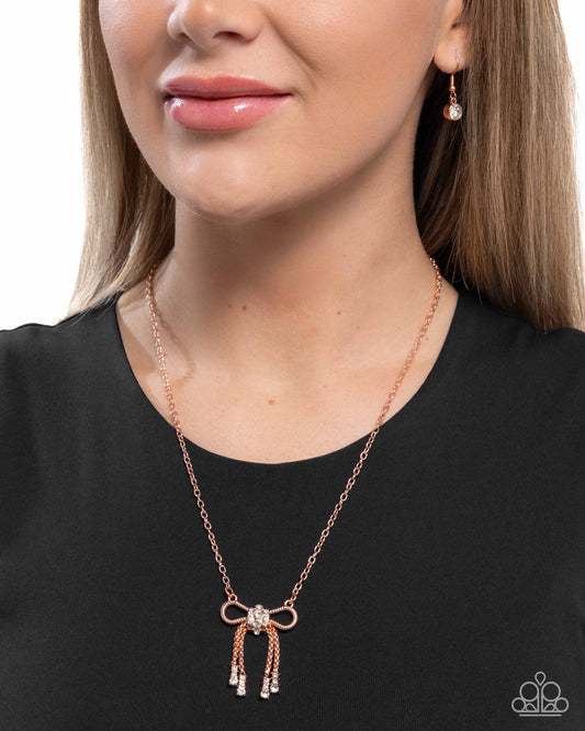 Coquette Celebrity - Copper White Rhinestone Bow Necklace - Paparazzi Accessories