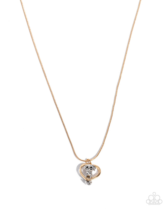 Delightful Dog - Gold Heart with Silver Dog Charm Necklace - Paparazzi Accessories