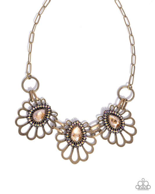 Teardrop Timeline - Brass - Champagne Teardrop Gem Necklace - Paparazzi Accessories