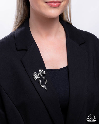 Bow Bonanza - Silver Bow Brooch - Paparazzi Accessories