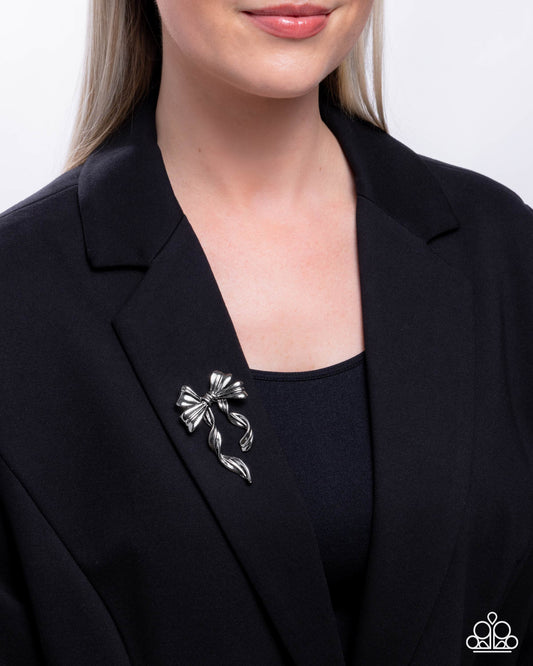 Bow Bonanza - Silver Bow Brooch - Paparazzi Accessories